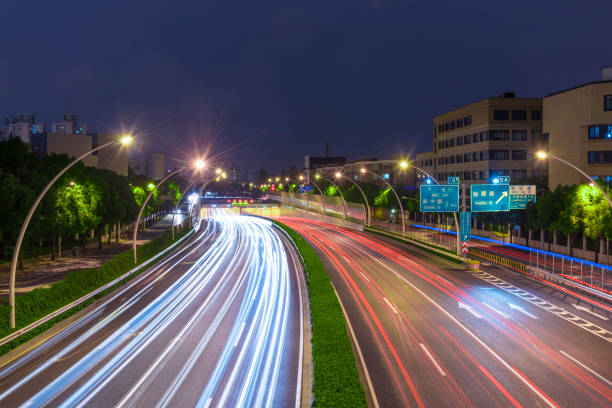 istock The cars on the highway light trails 1132423383