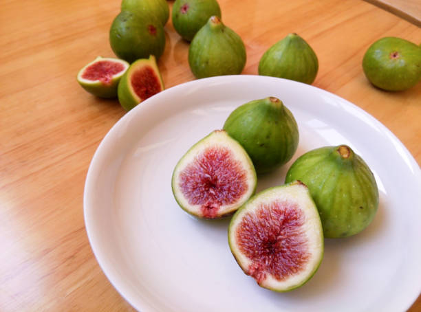Green ripe figs Green ripe figs 成熟 stock pictures, royalty-free photos & images