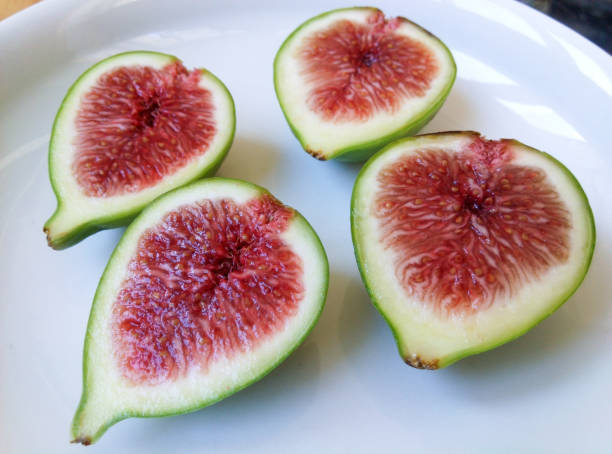 Green ripe figs Green ripe figs 成熟 stock pictures, royalty-free photos & images