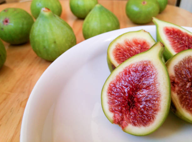 Green ripe figs Green ripe figs 成熟 stock pictures, royalty-free photos & images