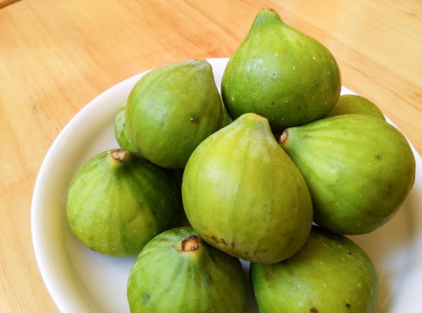 Green ripe figs Green ripe figs 成熟 stock pictures, royalty-free photos & images