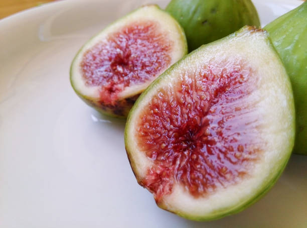 Green ripe figs Green ripe figs 成熟 stock pictures, royalty-free photos & images