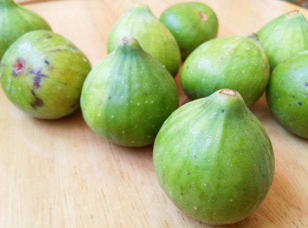 Green ripe figs Green ripe figs 成熟 stock pictures, royalty-free photos & images