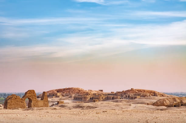 View of the Valley of the Kings View of  the Valley of the Kings in Egypt, with a blue and pink sky over the desert amon photos stock pictures, royalty-free photos & images