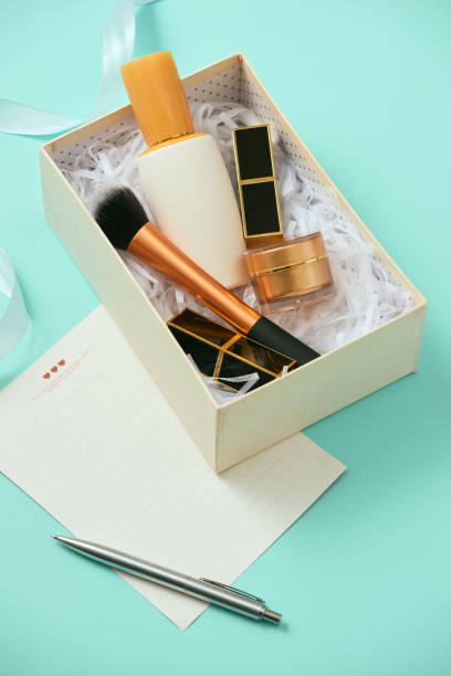 istock Make up gift box with serum, blush, brushes, cream and lipsticks indoors 1132431534