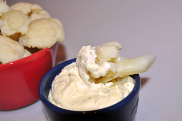 istock pieces of white cabbage with cheese sauce 1132431749