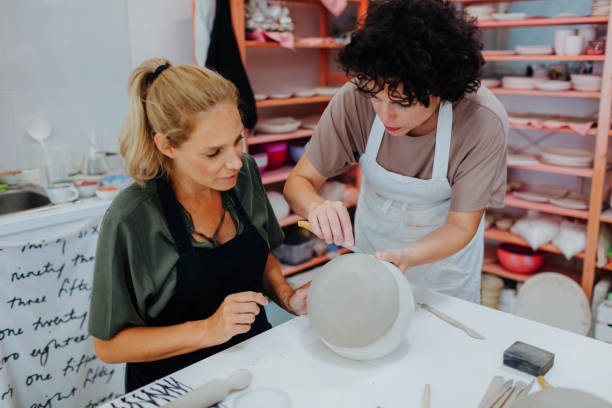 istock Group of women on ceramics workshop 1132431821
