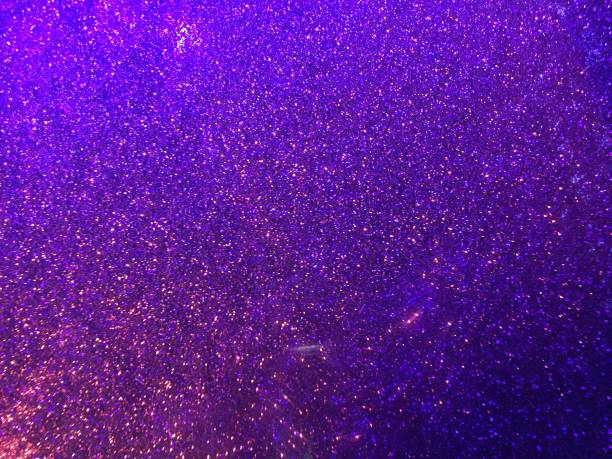 istock Purple and blue sparkling 1132433312