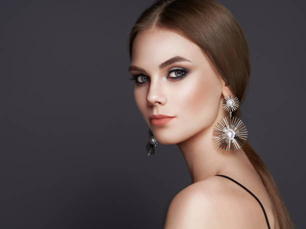 istock Brunette woman with long shiny smooth hair 1132434754