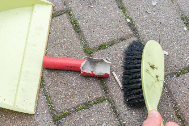 Cleaning the sidewalk after New Year's Eve