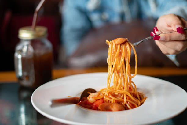istock Spaghetti and sausages with sauce. 1132439551