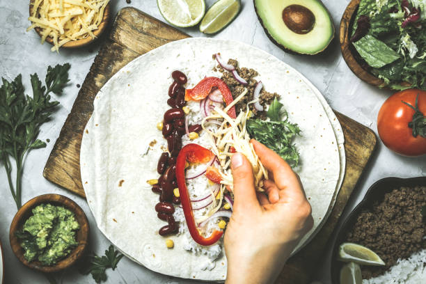 istock Mexican food - burrito and ingredients 1132441985