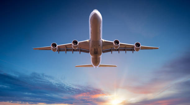 istock Commercial airplane jetliner flying above dramatic clouds. 1132442874