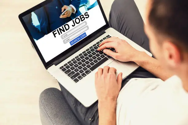 Photo of Businessman Internet Online Job Search application Concept