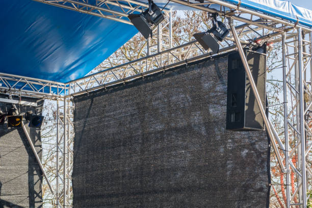 istock Stage construction with trusses, loudspeakers and stage lighting 1132443157