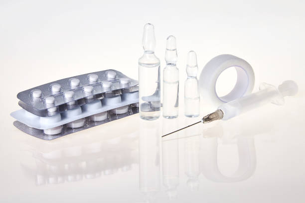 istock Tablets, medical ampoules and syringe injection 1132445272