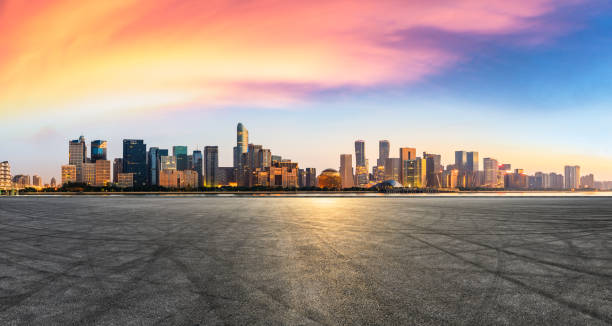Empty asphalt square and Hangzhou business district cityscape