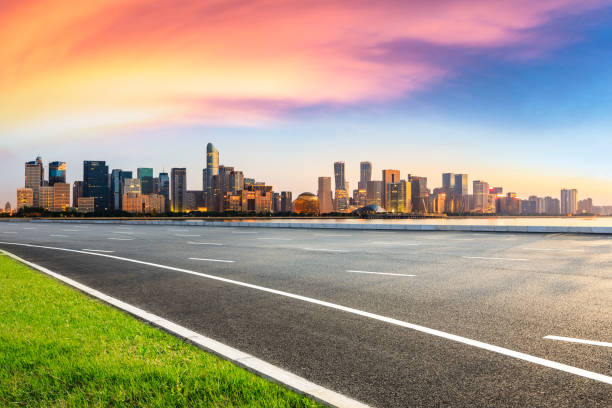 istock Asphalt road through Hangzhou business district 1132447044