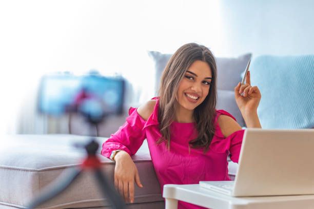 istock Friendly woman internet teacher tutor looking at camera talking. 1132449332