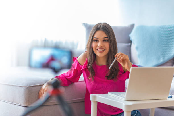 istock Young businesswoman recording vlog 1132449432