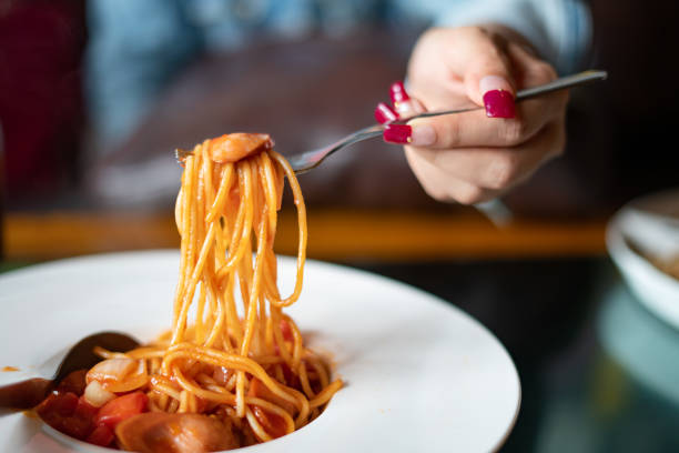 istock Spaghetti and sausages with sauce. 1132449470