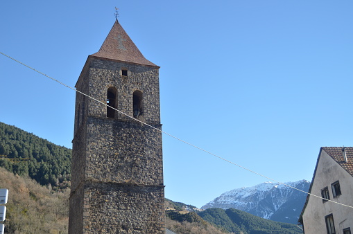 Campanario de la iglesia parroquial de nuestra Señora de la asunción Bielsa pueblo. photo