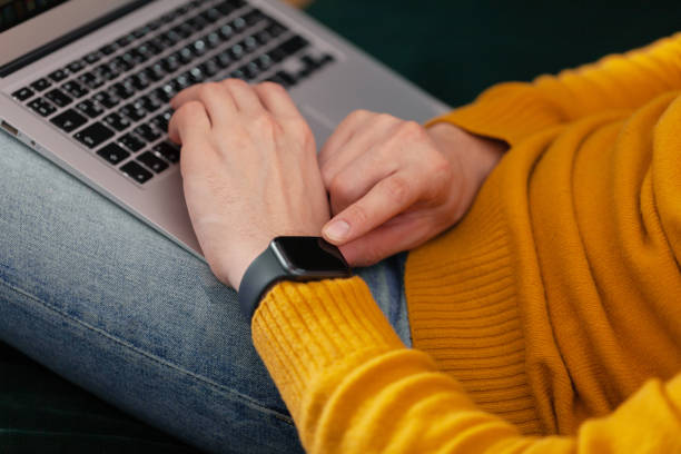 istock Men's hand touching watch on top view. Can be used as mock up 1132450763