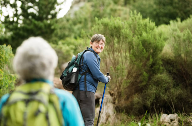 istock Motivating her friend during hike 1132455785