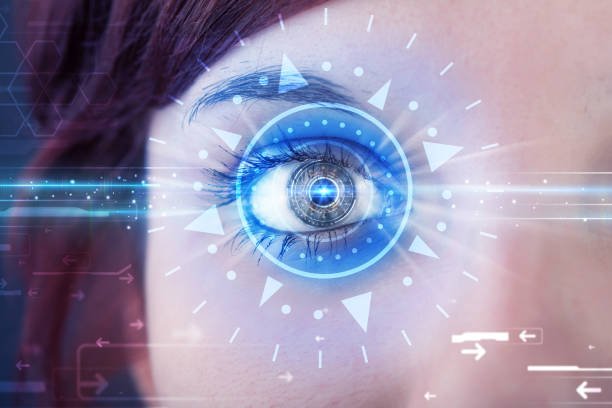istock Cyber girl with technolgy eye looking into blue iris 1132458065