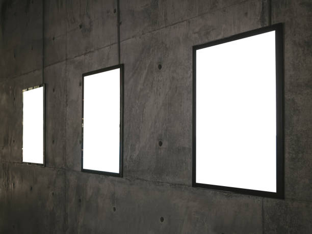 istock Mock up posters Blank picture frame on cement wall 1132459446