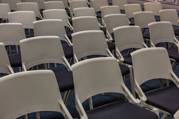 istock Rows of seats with chairs in a conference room 1132459768