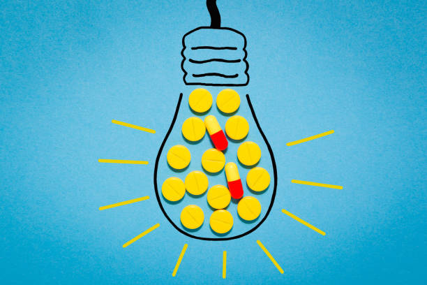 There is an idea - to take medication. Medications will help. The lamp is lined with yellow pills on a blue background.
