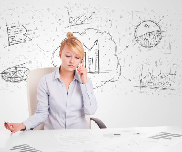 istock Business woman sitting at table with hand drawn graph charts 1132460580