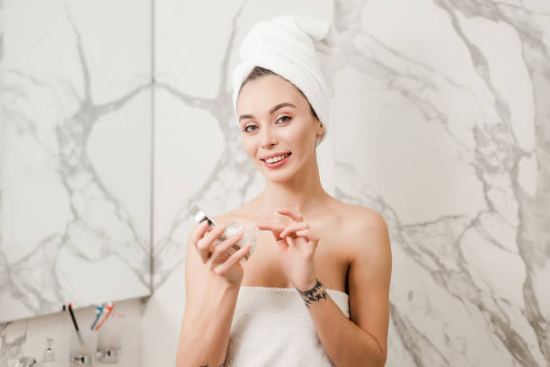 istock Attractive girl in the bathroom doing beauty routine 1132461983