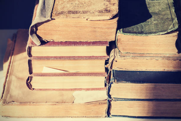 istock Stack of old books education retro concept background, many books piles with copy space for text. 1132462047