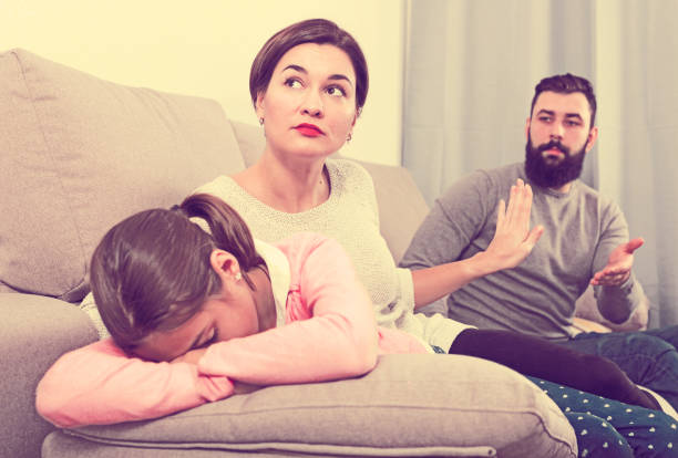 istock Father lecturing wife and daughter 1132462537