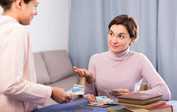istock Daughter asks cash from mother 1132462565