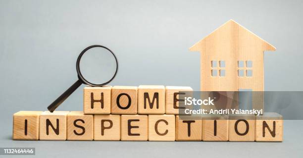 Wooden Blocks With The Word Home Inspection And The House Resale Residential Property Condition The Study Of The State Of The House Associated With The Sale Of Housing Property Valuation Stock Photo - Download Image Now