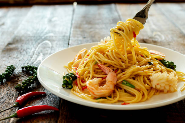 istock spicy spaghetti with seafood on plate. 1132464941