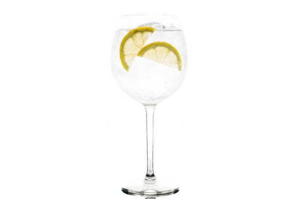 istock Gin based cocktail in wine glass isolated on white background 1132465956