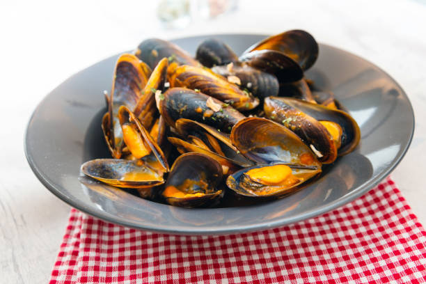 istock Mussel with white wine sauce on table 1132466214
