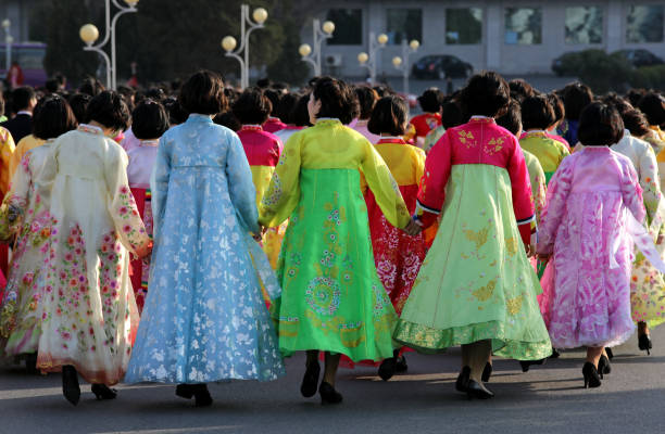 April 15, 2018. Pyongyang, North Korea.\nWomen in local dress returning from the birthday celebrations of North Korea's founding leader Kim Il-Sung. \nFor the birthday celebrations of North Korea founding leader Kim Il-Sung, ceremonies are held in many parts of the city.