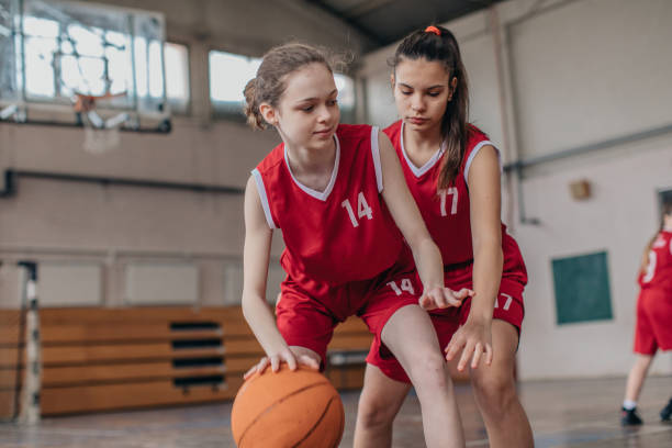 istock Two young girls in basketball duel 1132471009