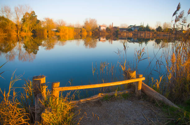 istock sunset on the lake with reflections in the blue water 1132471035