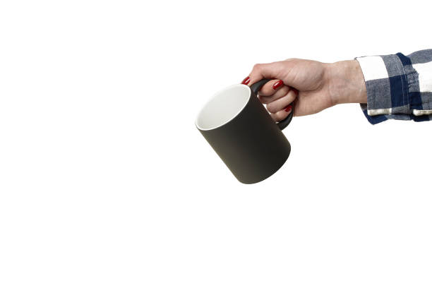 istock mug for drawing an image on it in a female hand on a white background 1132474023