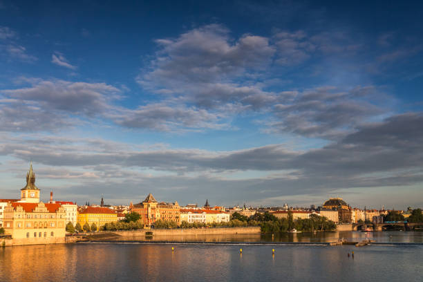 istock Vltava river and its waterfront in Prague at sunset. 1132475521