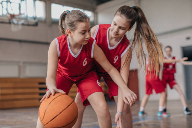 istock Girls basketball match 1132475568