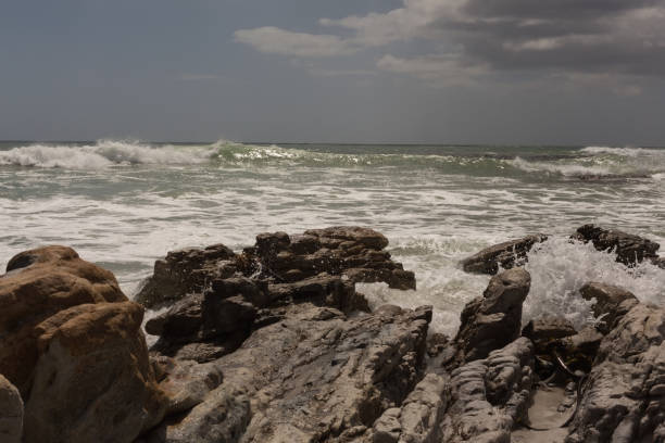 istock Sea waves splashing on the rock 1132476185