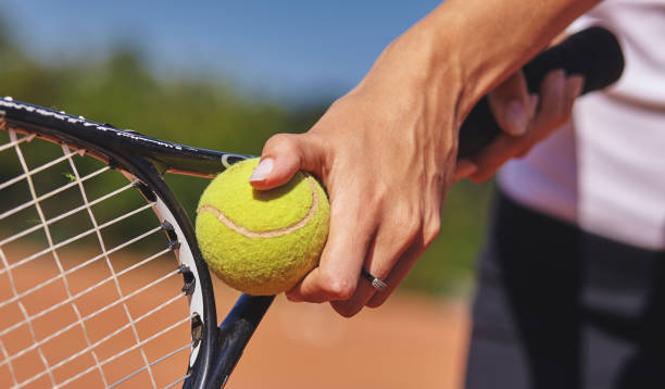 istock a Tennis player holding racket and ball in hands 1132480406