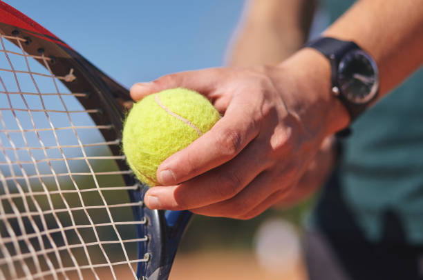 istock a Tennis player holding racket and ball in hands 1132480540